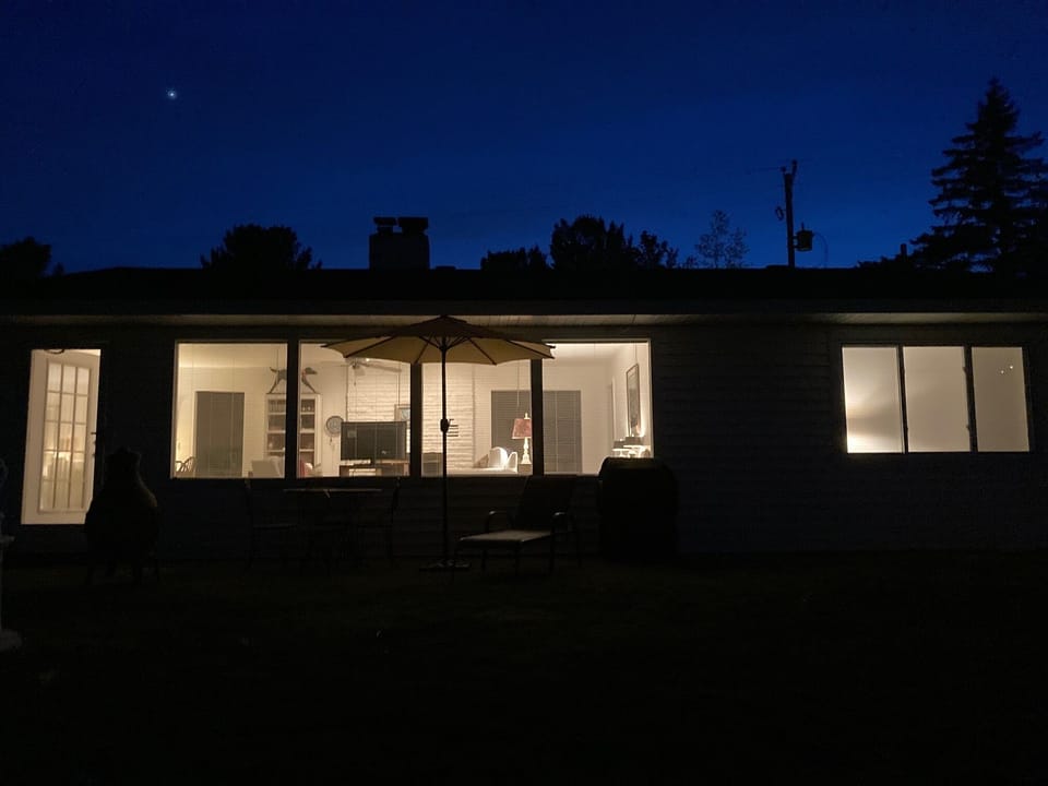 Lake house at night.
