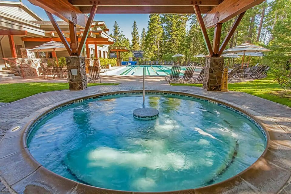 One of the 3 year-round hot-tubs in Rec. Center with year-round lap pool in background.