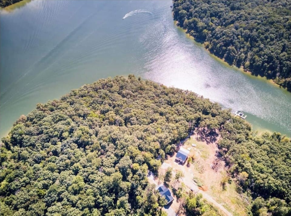 drone view of house and cove