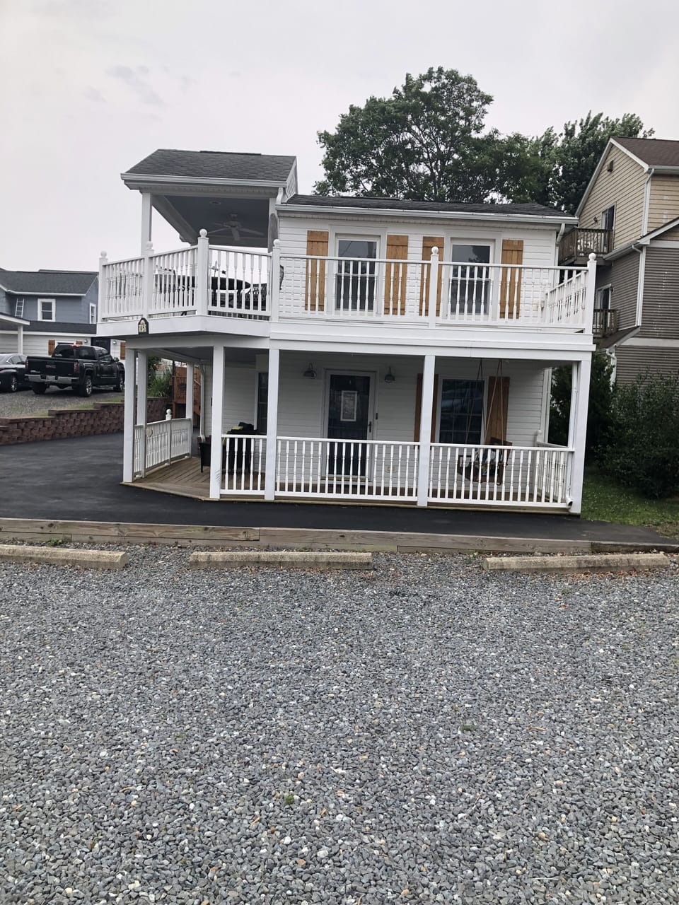 This is the front of the house. Park right beside the railing in DRIVEWAY 