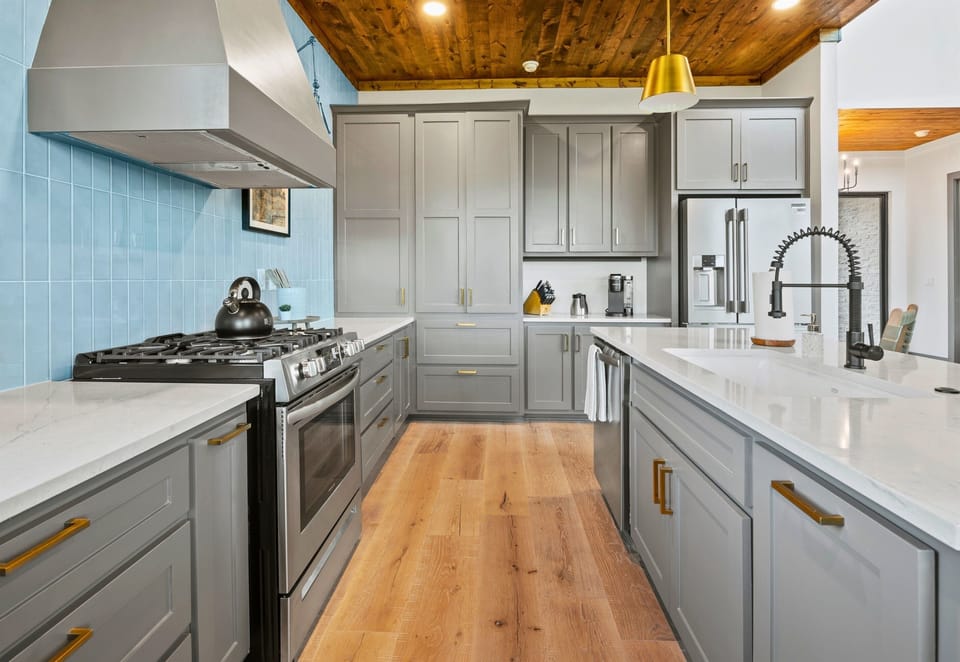 Experience a touch of gourmet in your getaway—our kitchen boasts state-of-the-art appliances and a chic backsplash that makes every meal feel like a special occasion.