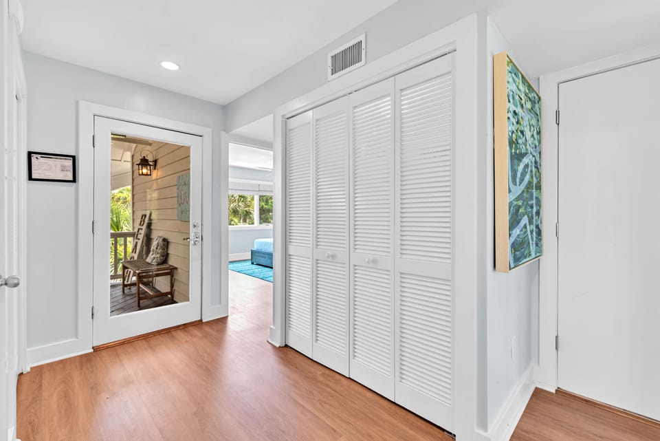 This home has a reverse floor plan, with guests rooms on the first floor and the main living area on the second