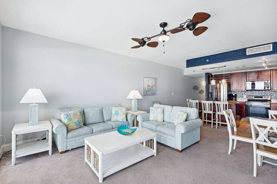 Gulf View Living Area with Flat Screen TV, Sleeper Sofa and Private Balcony Access