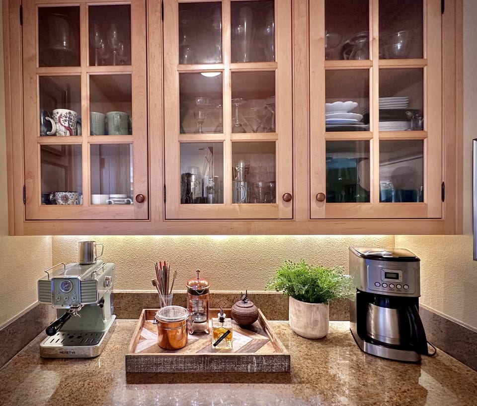 Coffee and tea station- drip, espresso, French press and plenty of glassware
