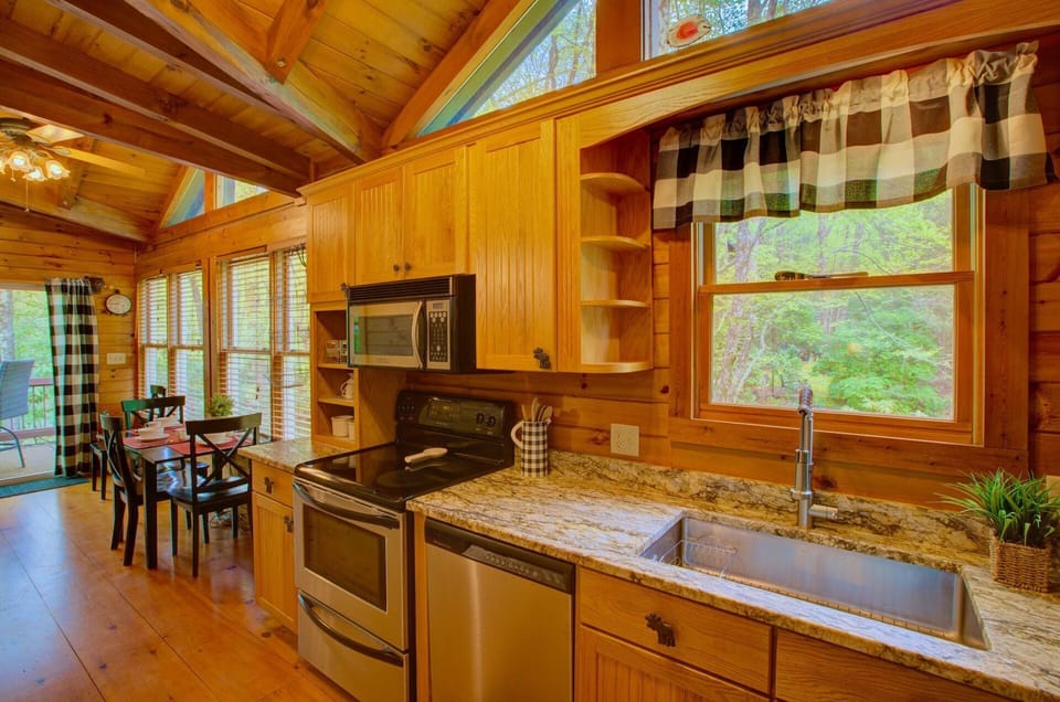 Kitchen Leads out to Creekside Another Al Fresco Dining Table for 4