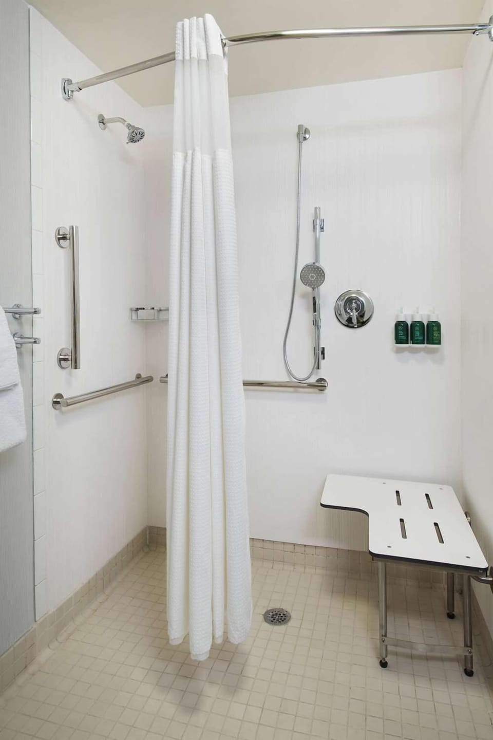 Refresh effortlessly in a bright, accessible walk-in shower.