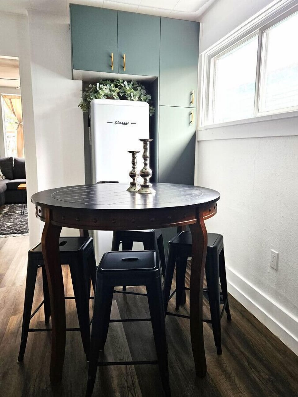 Fridge and freezer available for use. Bar height table for dining.