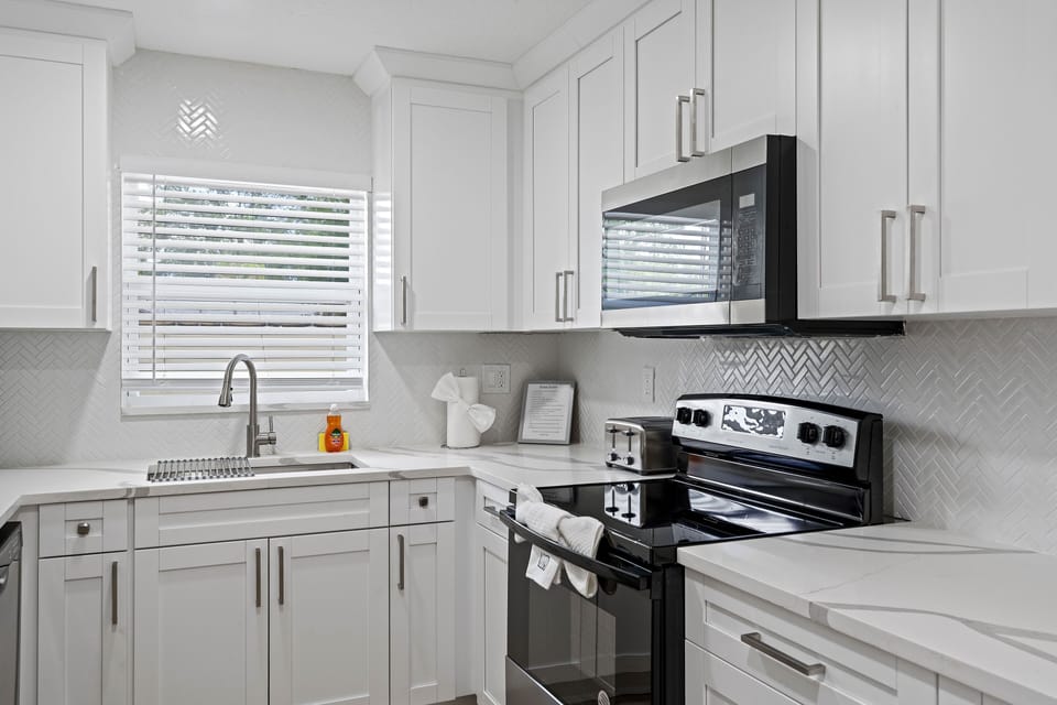 Modern kitchen with stainless steel appliances