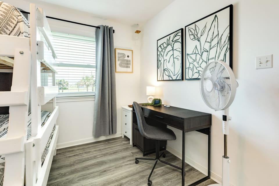 Desk area and tv makes a great space for the kids or teens in your group