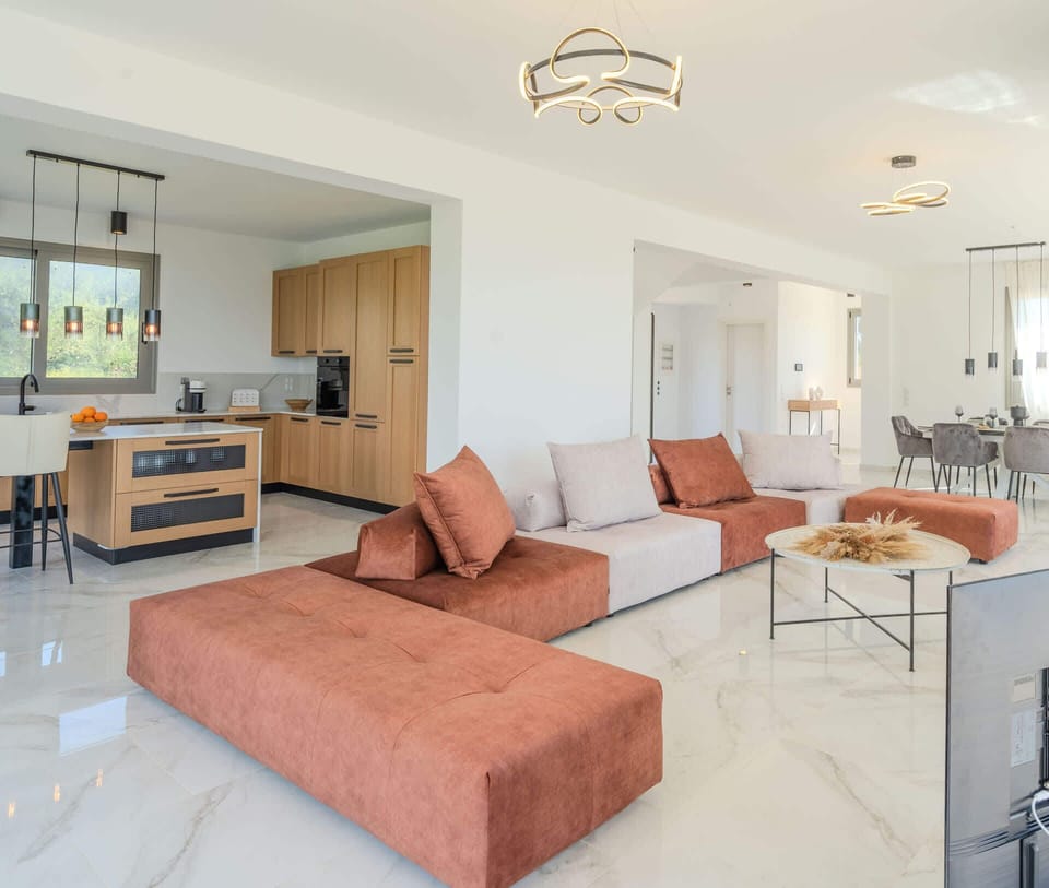 The spacious minimalistic living room with panoramic views