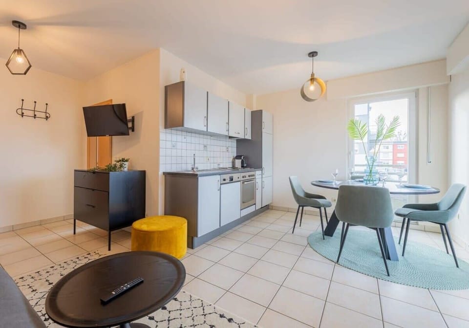 Cook, dine, and relax in our spacious kitchen and dining area, designed for your convenience.