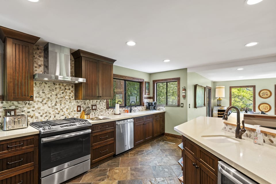 New, stainless steel appliances throughout the kitchen.
