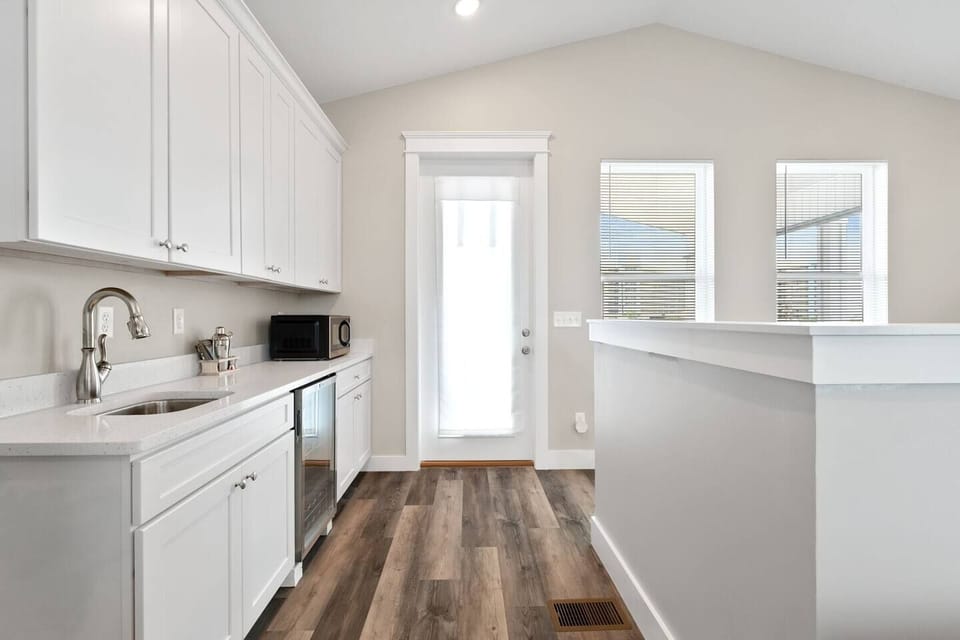 3rd FL wet bar with mini fridge.