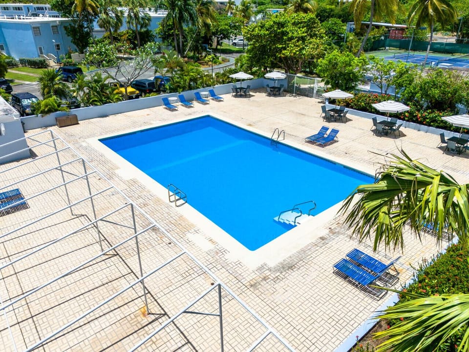 Huge pool with tables and umbrellas and plenty of sun loungers!