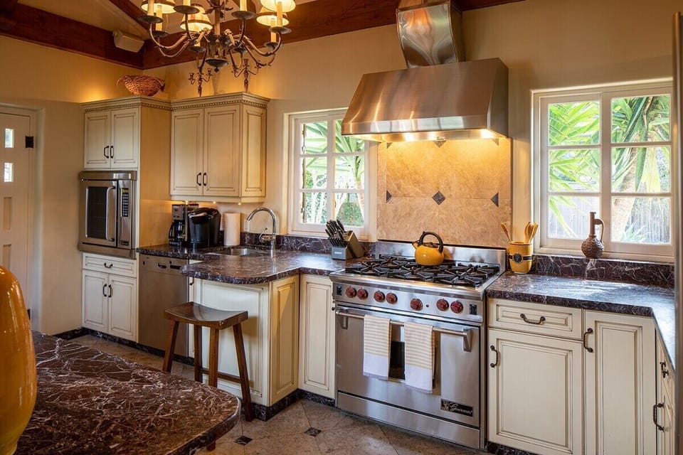Kitchen with gas stove. 