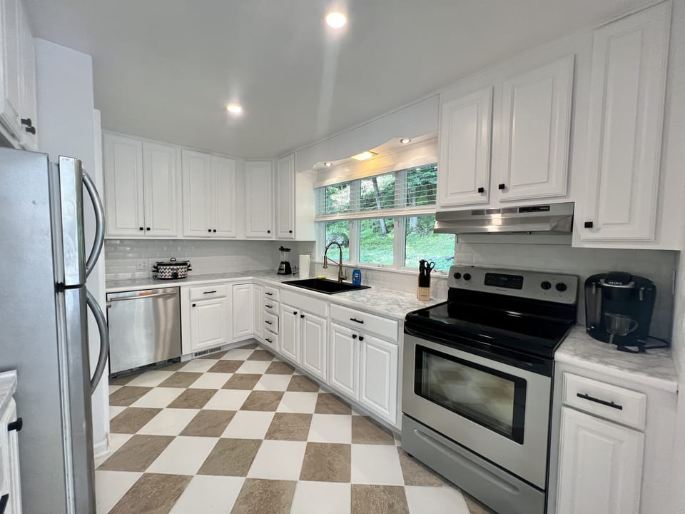 Fully equipped chef's dream, where flavors blend & memories simmer.