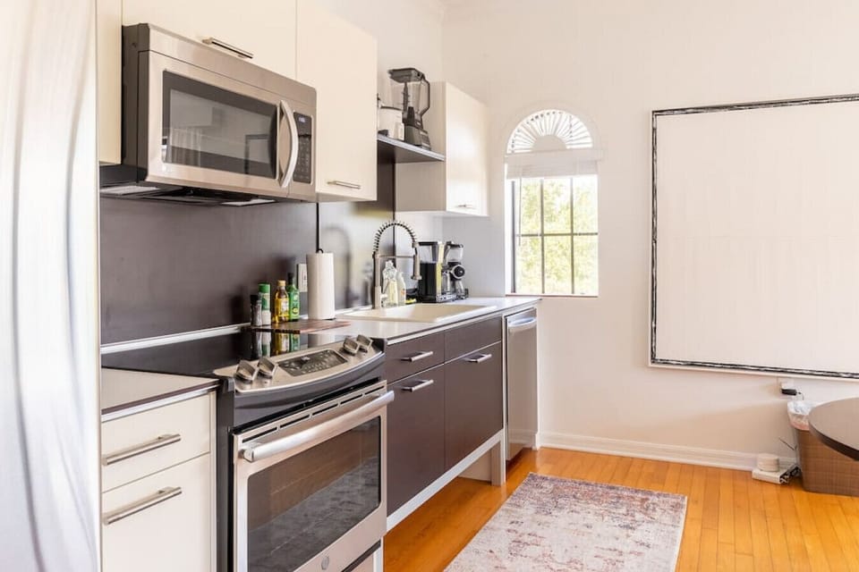 Full kitchen with brand new appliances and coffee maker.