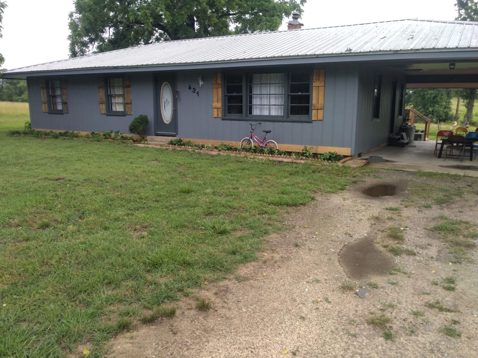 The Rocking J Ranch House has an indoor bathroom with a tub and shower.  