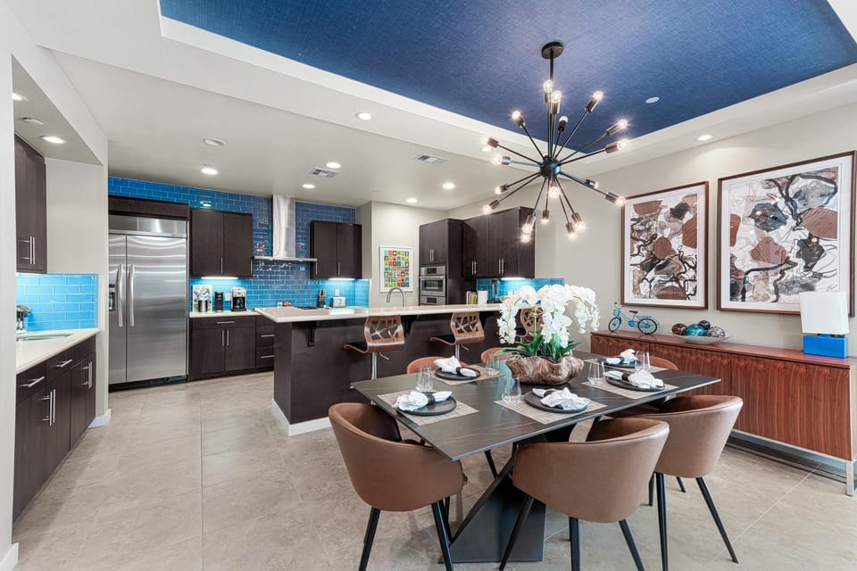 Dining Room Is Adjacent To Full Kitchen With Wet Bar