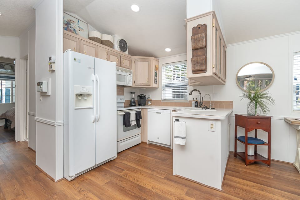 Full kitchen with oven and dishwasher