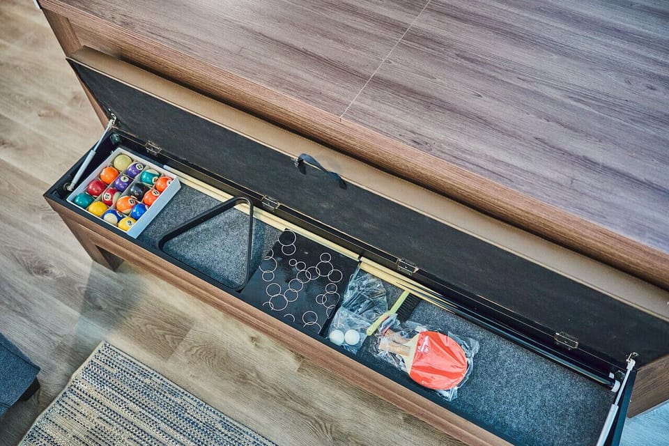 Large living room with pool table.