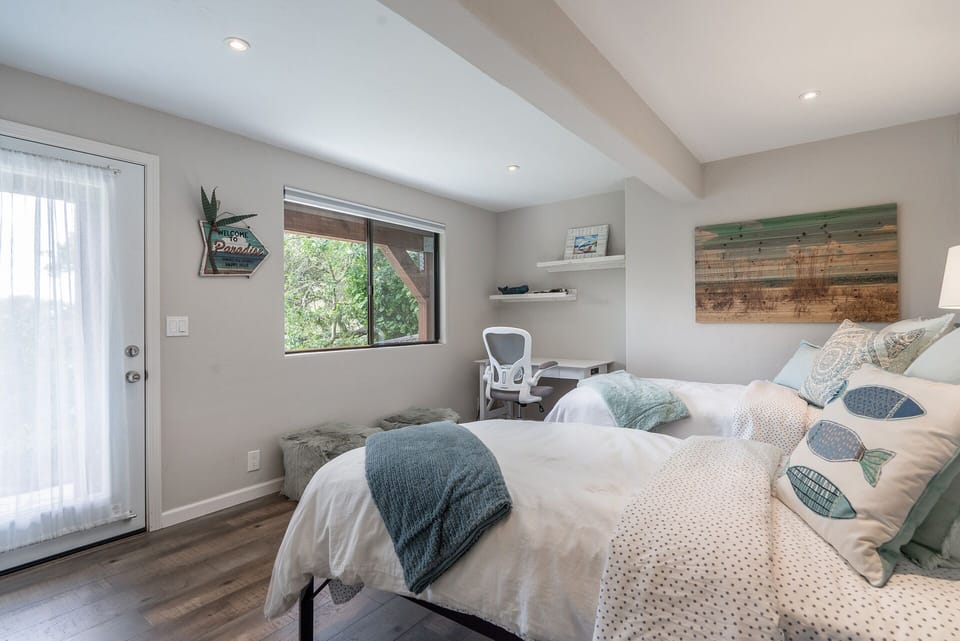 Downstairs bedroom with desk area.