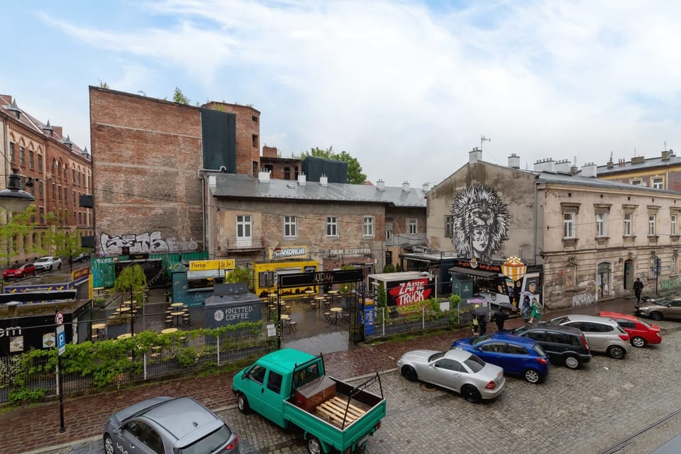 A street view of the surrounding area, showcasing the blend of historical and modern architecture.
