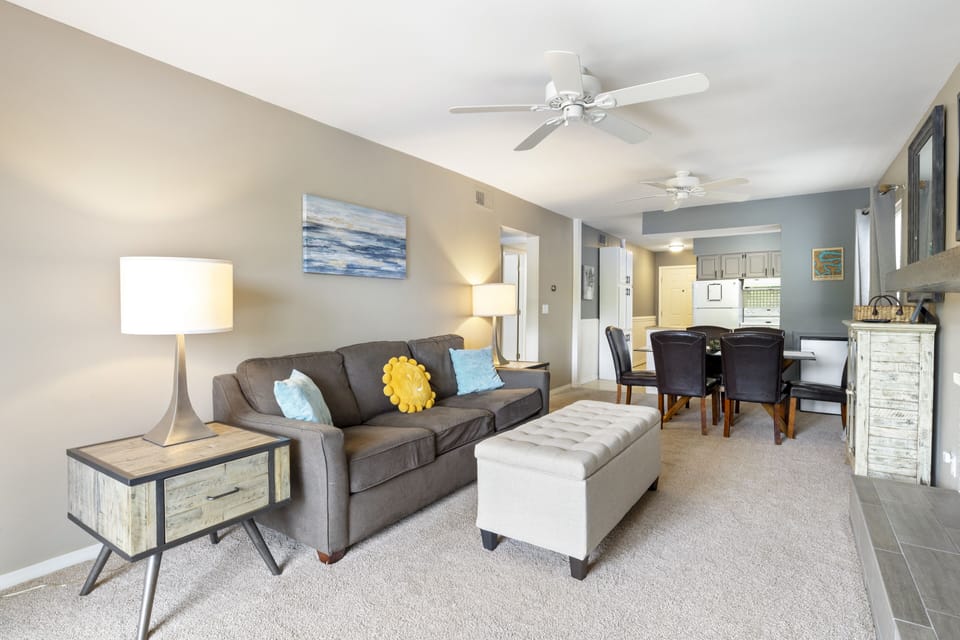 The open concept design gives convenient and easy access from the kitchen and dining area to the living room.