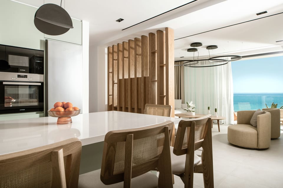 Open plan sea view living room & kitchen lounge.