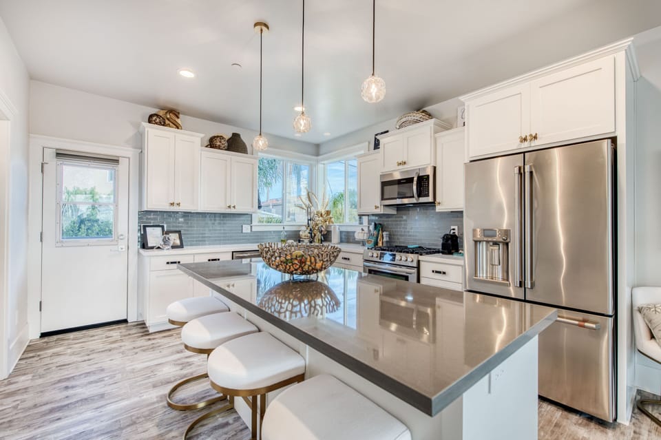 Sleek, contemporary lines in an open kitchen area.