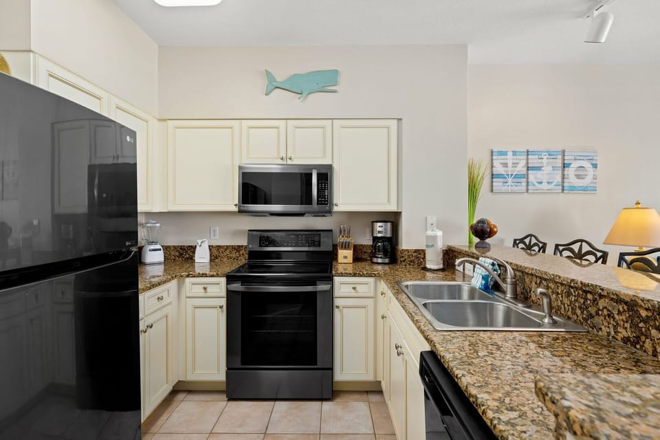 Fully Equipped Kitchen with Coffee Maker, Granite Counters & Stainless Appliances • Family-Ready Beach Stay