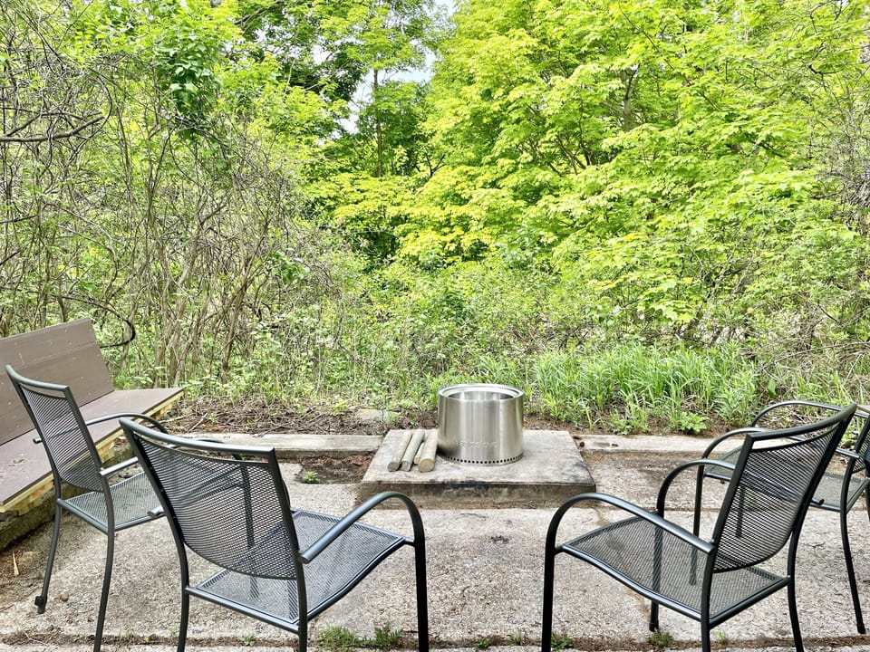 Campfire space with smokeless-stove overlooking a ravine