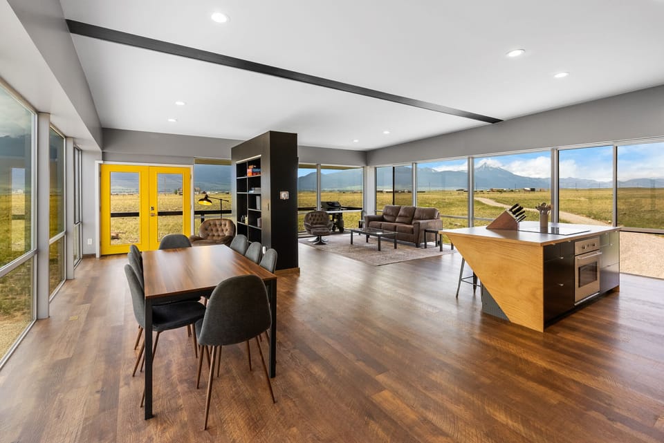 Large open concept living, dining and kitchen areas.