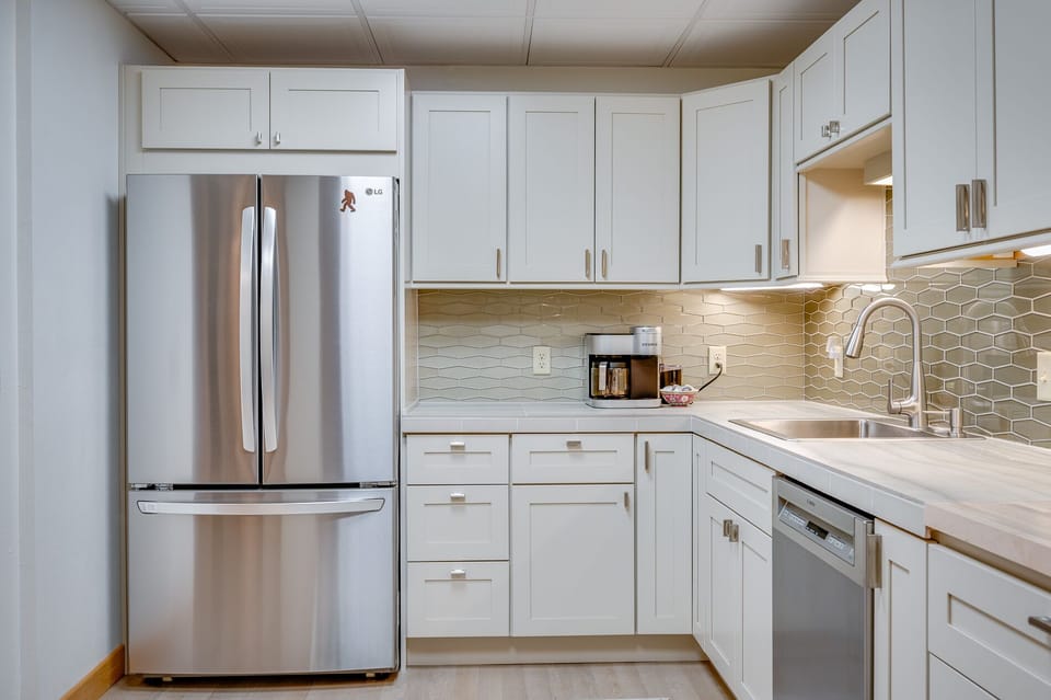 New large kitchen* area with ample counter space.