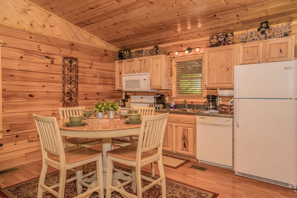 Open kitchen with dining space. Fridge manual ice, two coffee makers. 