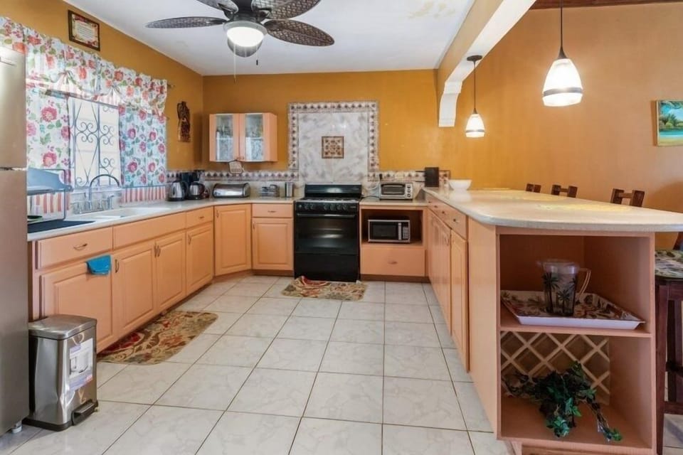 Indoors, Kitchen, Floor, Ceiling Fan, Refrigerator