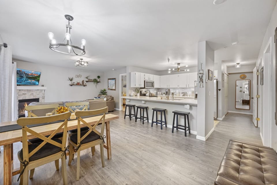 Open floor plan, dining table and counter seating for four