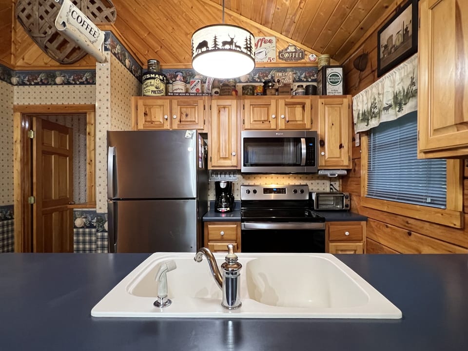 The kitchen is small but gives you all the tools for making meals at the cabin