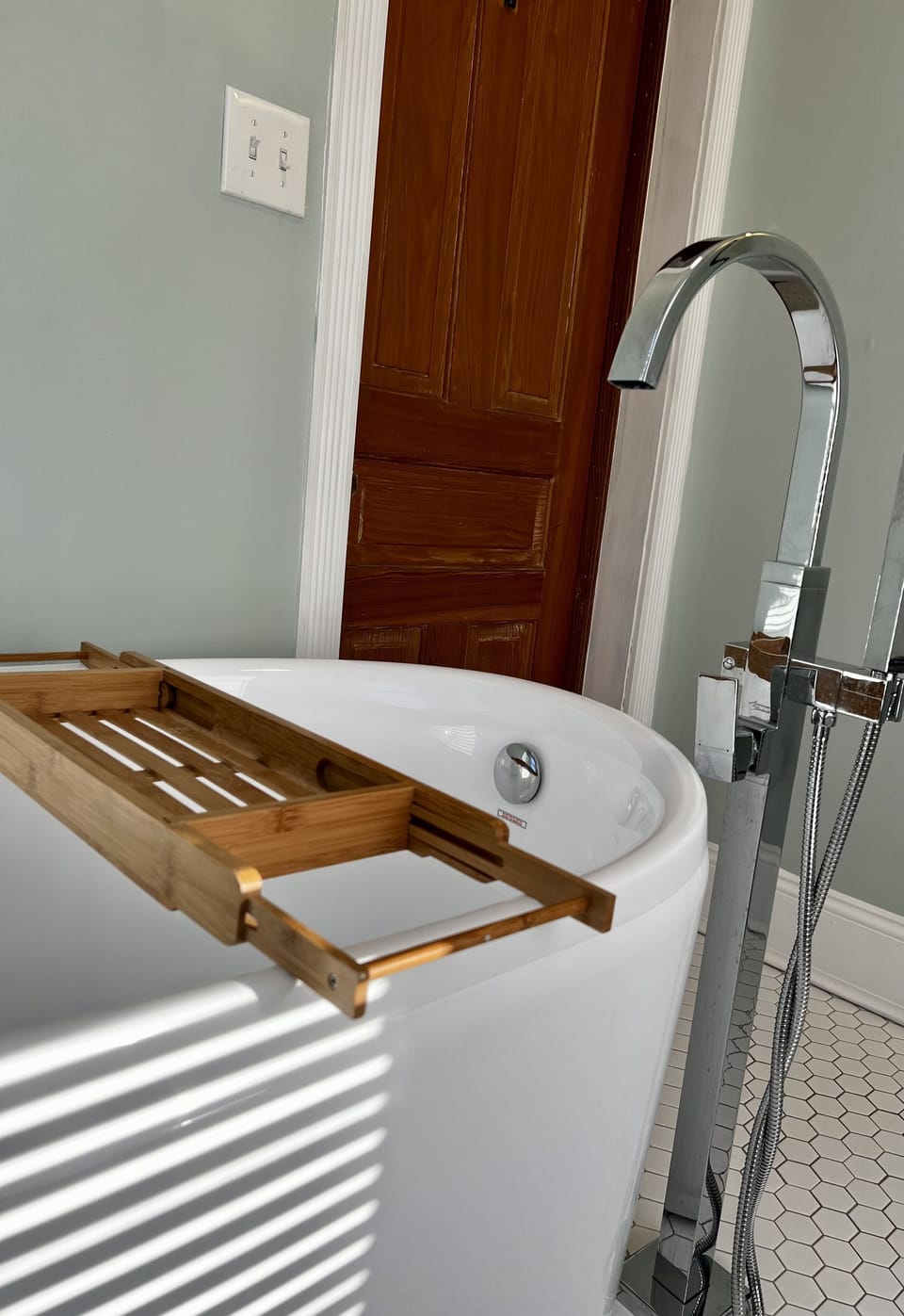 Soaking tub, with sprayer also.