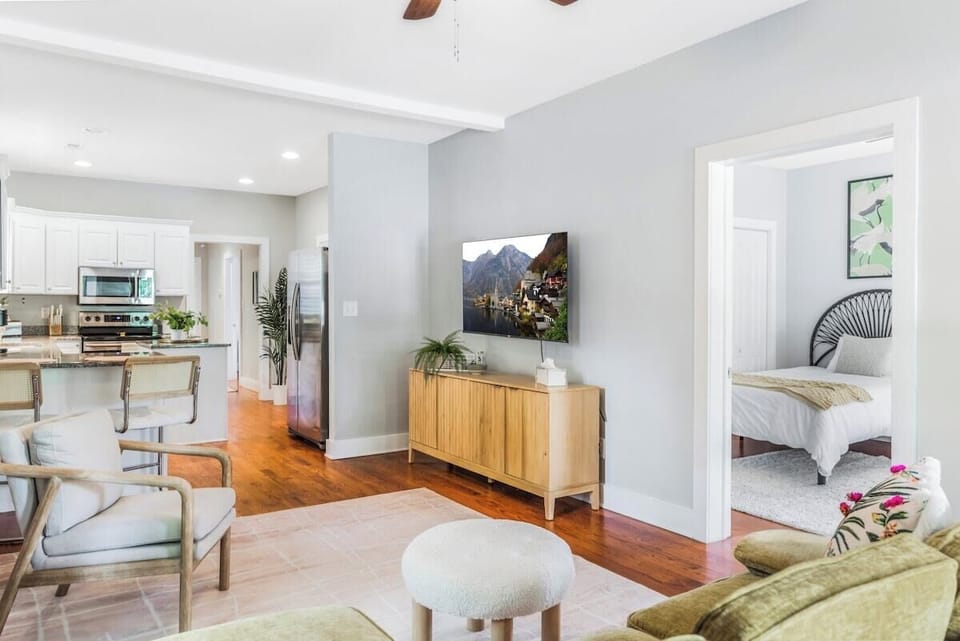 Large flatscreen TV and entertainment center in living room 