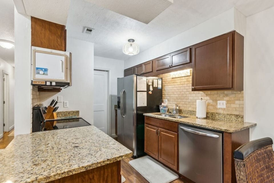 Galley Kitchen Open to Living and Dining Areas