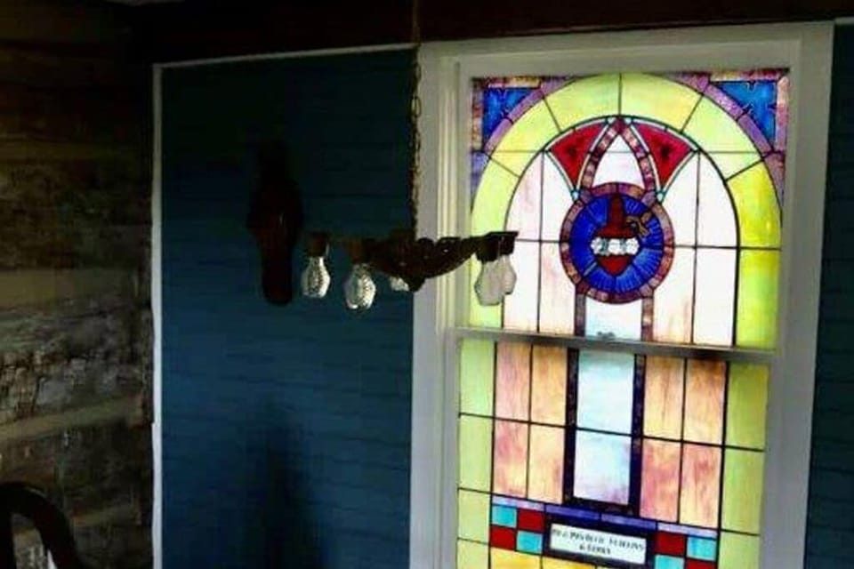Stained glass window in entry.