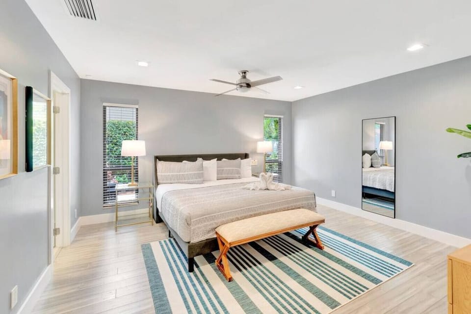 Open and airy, bathed in natural light. This bedroom is the epitome of serenity.