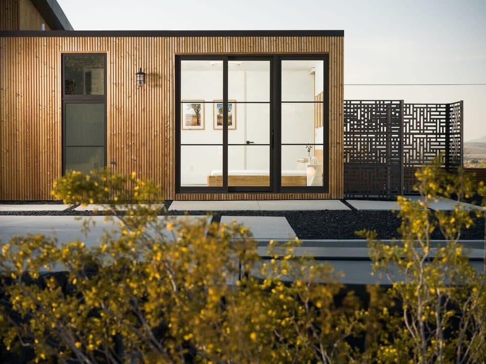 Step into a backyard that is a true visual masterpiece. Explore the fully fenced compound and discover multiple hangout spaces designed for your comfort and enjoyment or indulge in the outdoor shower, immersing yourself in nature's embrace.