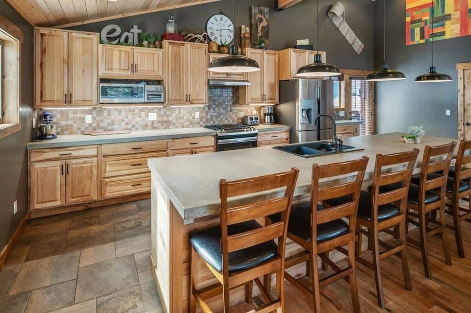 Well appointed kitchen with large island and open layout