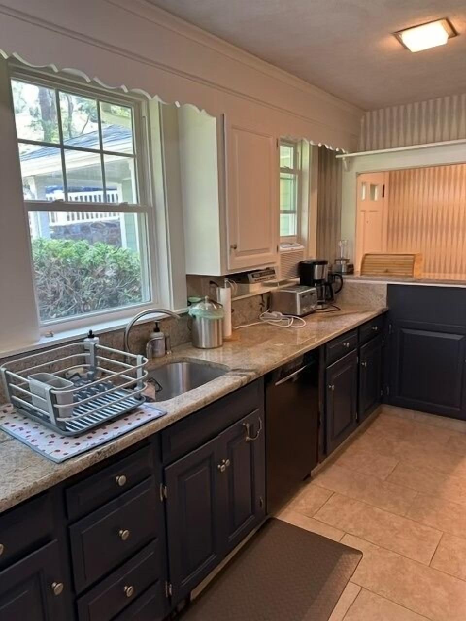 Fully stocked kitchen with granite counter tops