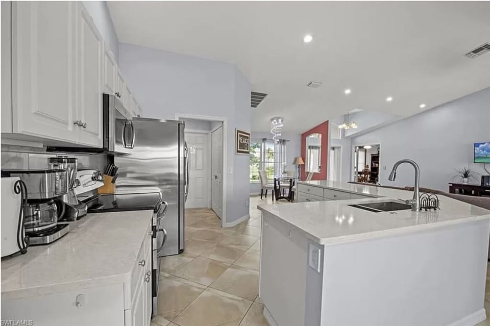 Kitchen with amenities--coffee maker, toaster, dishwasher, pots n pans, etc.