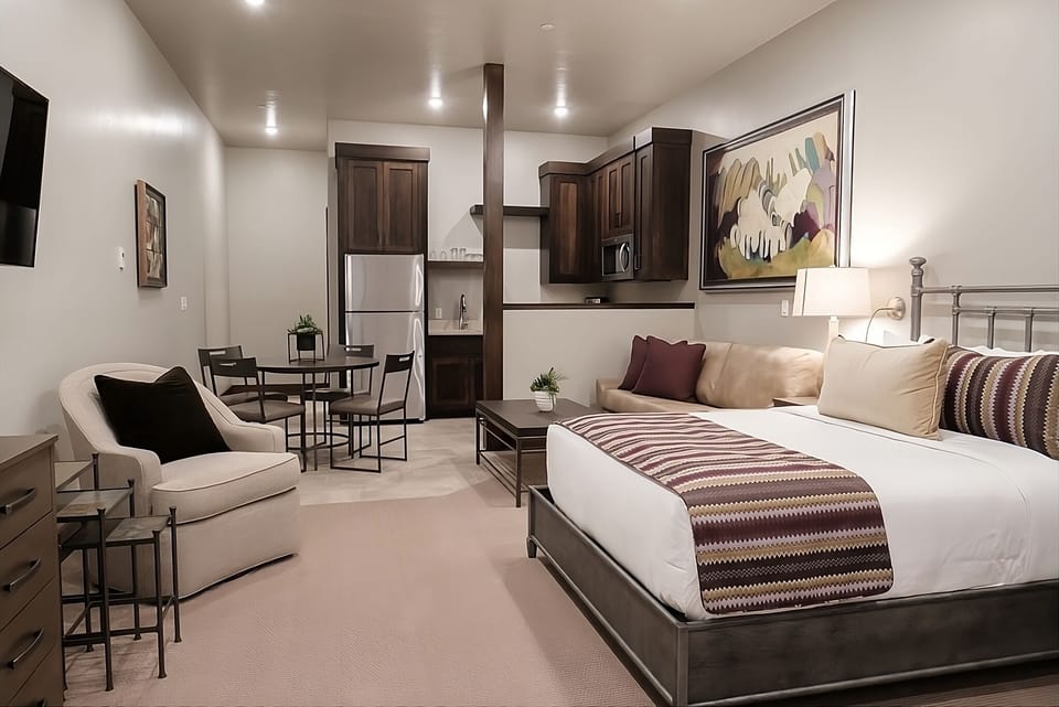Relax in your open suite with lounge seating and kitchenette.