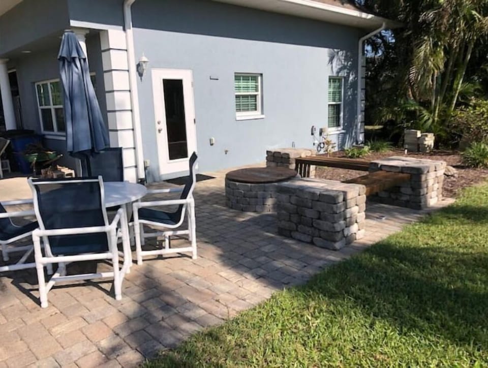 Outdoor patio area.  Seating area and firepit.