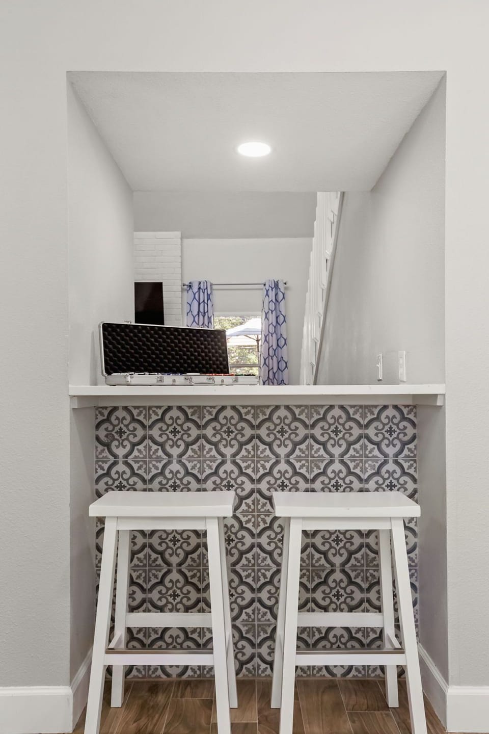 Unwind and chat with friends or family at our chic kitchen bar, a central hub for conversation and enjoying snacks or drinks.